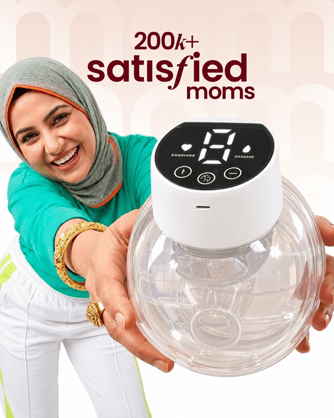 Mother holding the MomSolutions wearable pump